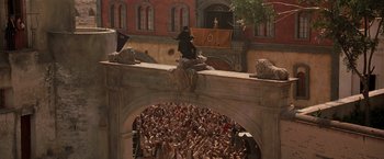 Movie still from “The Mask of Zorro” (1998), directed by Martin Campbell – A crowd of people standing on top of a building; Extreme Wide shot, High angle