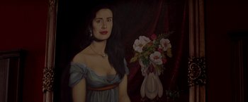 Movie still from “The Mask of Zorro” (1998), directed by Martin Campbell – A painting of a woman in a blue dress with a vase of flowers; Close Up shot, Low angle