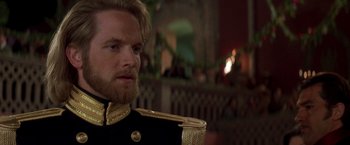 Movie still from “The Mask of Zorro” (1998), directed by Martin Campbell – A person wearing a uniform; Close Up shot, Over the shoulder angle