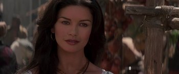 Movie still from “The Mask of Zorro” (1998), directed by Martin Campbell – A person wearing a necklace; Close Up shot, Over the shoulder angle