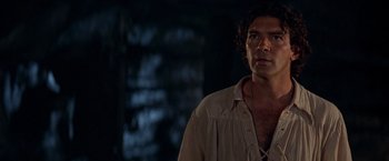 Movie still from “The Mask of Zorro” (1998), directed by Martin Campbell – A person wearing a white shirt; Close Up shot, Over the shoulder angle