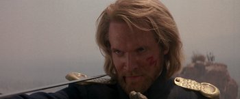 Movie still from “The Mask of Zorro” (1998), directed by Martin Campbell – A person holding a sword; Close Up shot, Over the shoulder angle