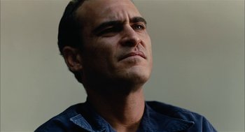 Movie still from “The Master” (2012), directed by Paul Thomas Anderson – A person looking up at the sky; Close Up shot, Low angle