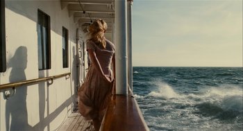 Movie still from “The Master” (2012), directed by Paul Thomas Anderson – A woman standing on a deck of a boat; Medium shot, Over the shoulder angle