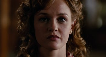Movie still from “The Master” (2012), directed by Paul Thomas Anderson – A woman's face with curly red hair; Close Up shot, Low angle
