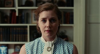 Movie still from “The Master” (2012), directed by Paul Thomas Anderson – A person wearing a dress; Close Up shot, Low angle