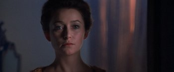 Movie still from “The Mission” (1986), directed by Roland Joffé – A person wearing a dress; Close Up shot, Over the shoulder angle