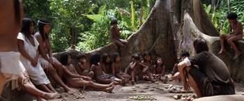 Movie still from “The Mission” (1986), directed by Roland Joffé – A group of children sitting on a tree branch; Wide shot, High angle