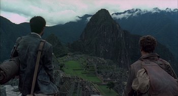 Movie still from “The Motorcycle Diaries” (2004), directed by Walter Salles – Two people looking out over a valley in the mountains; Wide shot, Over the shoulder angle