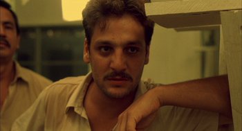 Movie still from “The Motorcycle Diaries” (2004), directed by Walter Salles – A person wearing a shirt; Close Up shot, Low angle