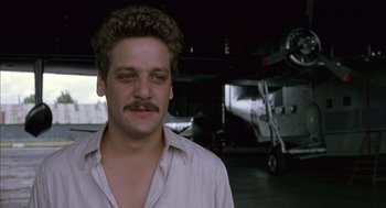 Movie still from “The Motorcycle Diaries” (2004), directed by Walter Salles – A person wearing a shirt; Close Up shot, Low angle