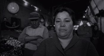 Movie still from “The Motorcycle Diaries” (2004), directed by Walter Salles – A woman with a sad look on her face; Close Up shot, Low angle