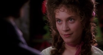 Movie still from “The Muppet Christmas Carol” (1992), directed by Brian Henson – A person wearing a white shirt; Close Up shot, Over the shoulder angle