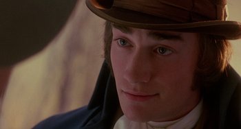Movie still from “The Muppet Christmas Carol” (1992), directed by Brian Henson – A person wearing a hat; Close Up shot, High angle