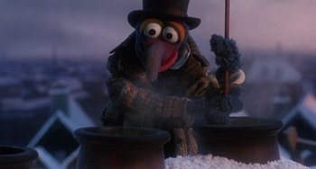Movie still from “The Muppet Christmas Carol” (1992), directed by Brian Henson – A muppet wearing a top hat; Medium shot, Low angle