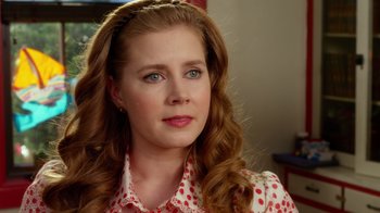 Movie still from “The Muppets” (2011), directed by James Bobin – A person with long red hair; Close Up shot, Over the shoulder angle