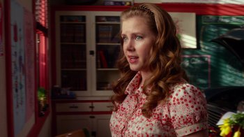 Movie still from “The Muppets” (2011), directed by James Bobin – A woman in a red and white polka dot shirt; Close Up shot, Over the shoulder angle