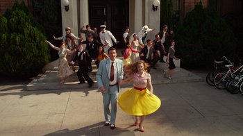 Movie still from “The Muppets” (2011), directed by James Bobin – A man and a woman dressed in 1 9 5 0's fashion; Wide shot, Low angle