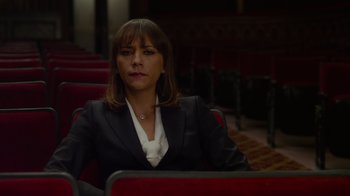 Movie still from “The Muppets” (2011), directed by James Bobin – A woman in a suit sitting in front of a computer; Medium shot, High angle