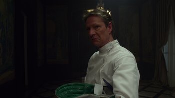 Movie still from “The Muppets” (2011), directed by James Bobin – A man in white shirt holding a green plate; Close Up shot, Low angle