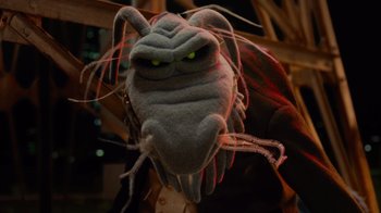 Movie still from “The Muppets” (2011), directed by James Bobin – A stuffed animal head with a creepy look on its face; Close Up shot, High angle