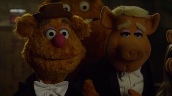 Movie still from “The Muppets” (2011), directed by James Bobin – Three stuffed animals wearing tuxedos; Close Up shot, High angle