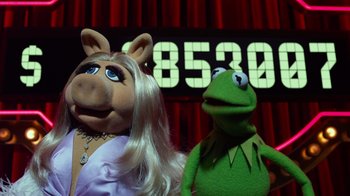 Movie still from “The Muppets” (2011), directed by James Bobin – A couple of puppets that are next to each other in a room; Close Up shot, Low angle