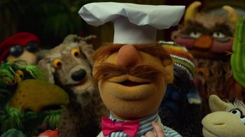 Movie still from “The Muppets” (2011), directed by James Bobin – The head of a muppet character; Close Up shot, Over the shoulder angle