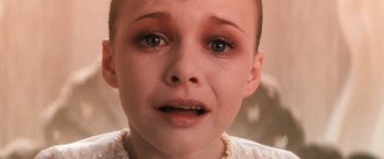 Movie still from “The NeverEnding Story” (1984), directed by Wolfgang Petersen – A person with a crying face; Close Up shot, High angle