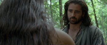 Movie still from “The New World” (2005), directed by Terrence Malick – A man with long hair and a beard; Close Up shot, Over the shoulder angle