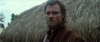 Movie still from “The New World” (2005), directed by Terrence Malick – A person with a beard; Close Up shot, Low angle