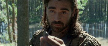 Movie still from “The New World” (2005), directed by Terrence Malick – A person holding a cell phone; Close Up shot, Over the shoulder angle