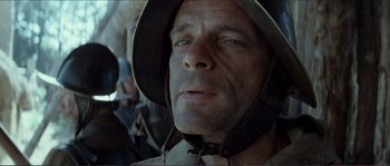 Movie still from “The New World” (2005), directed by Terrence Malick – A person wearing a hat; Close Up shot, Low angle