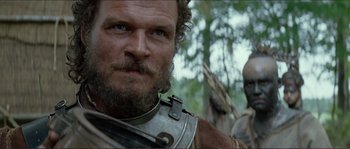 Movie still from “The New World” (2005), directed by Terrence Malick – A person with a beard; Close Up shot, Low angle