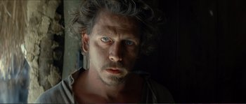 Movie still from “The New World” (2005), directed by Terrence Malick – A person with blue eyes; Close Up shot, Low angle