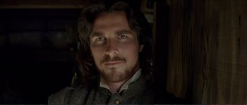 Movie still from “The New World” (2005), directed by Terrence Malick – A person with long dark hair; Close Up shot, Low angle