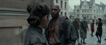 Movie still from “The New World” (2005), directed by Terrence Malick – A man and a woman are standing in front of each other; Medium shot, Over the shoulder angle