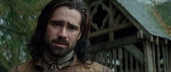 Movie still from “The New World” (2005), directed by Terrence Malick – A person with long hair and a beard; Close Up shot, Low angle