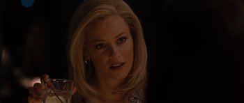 Movie still from “The Next Three Days” (2010), directed by Paul Haggis – A woman with blonde hair and blue eye shadow; Close Up shot, Over the shoulder angle