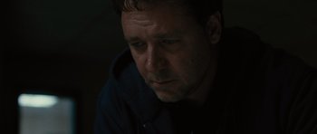 Movie still from “The Next Three Days” (2010), directed by Paul Haggis – A person looking at the camera; Close Up shot, Over the shoulder angle