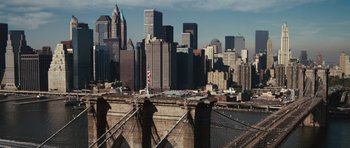 Movie still from “The Next Three Days” (2010), directed by Paul Haggis – A view of a bridge and a city skyline; Extreme Wide shot, High angle