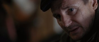 Movie still from “The Next Three Days” (2010), directed by Paul Haggis – A person wearing a hat; Close Up shot, Over the shoulder angle