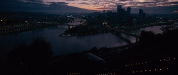 Movie still from “The Next Three Days” (2010), directed by Paul Haggis – A view of a city at night from a hill; Extreme Wide shot, High angle