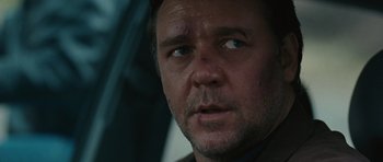 Movie still from “The Next Three Days” (2010), directed by Paul Haggis – Russell crowe's face in a car; Close Up shot, Over the shoulder angle