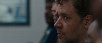 Movie still from “The Next Three Days” (2010), directed by Paul Haggis – A man's face as he looks into the distance; Close Up shot, Over the shoulder angle