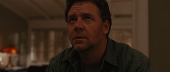 Movie still from “The Next Three Days” (2010), directed by Paul Haggis – A person wearing a shirt; Close Up shot, Low angle