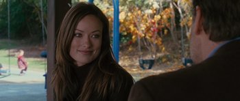 Movie still from “The Next Three Days” (2010), directed by Paul Haggis – A person sitting on a bench; Close Up shot, Over the shoulder angle