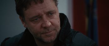 Movie still from “The Next Three Days” (2010), directed by Paul Haggis – A man's face in a black jacket; Close Up shot, Over the shoulder angle