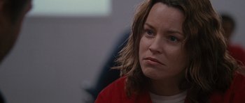 Movie still from “The Next Three Days” (2010), directed by Paul Haggis – A person wearing a red shirt; Close Up shot, Over the shoulder angle