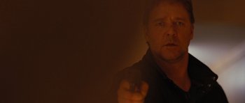 Movie still from “The Next Three Days” (2010), directed by Paul Haggis – A man pointing a gun at the camera; Close Up shot, Over the shoulder angle